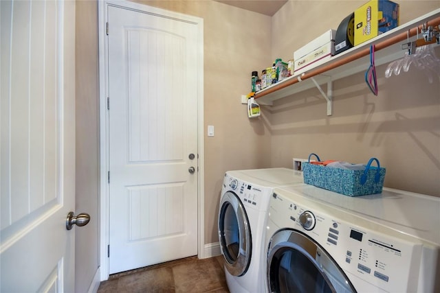 2433 Independence Dr Unit B105, Austin, TX 78745 - laundry area with washing machine and clothes dryer, laundry area, and baseboards