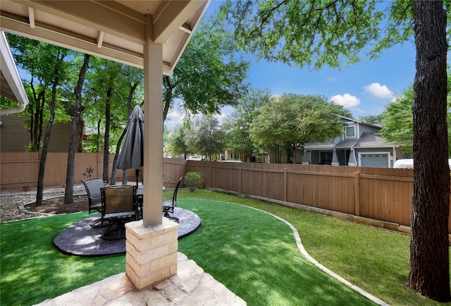 2433 Independence Dr Unit B105, Austin, TX 78745 - view of yard featuring a fenced backyard and a patio area