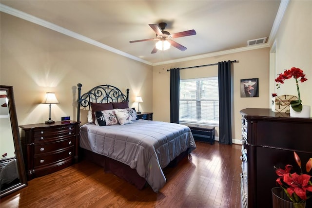 2433 Independence Dr Unit B105, Austin, TX 78745 - bedroom featuring baseboards, visible vents, dark wood-style flooring, and crown molding