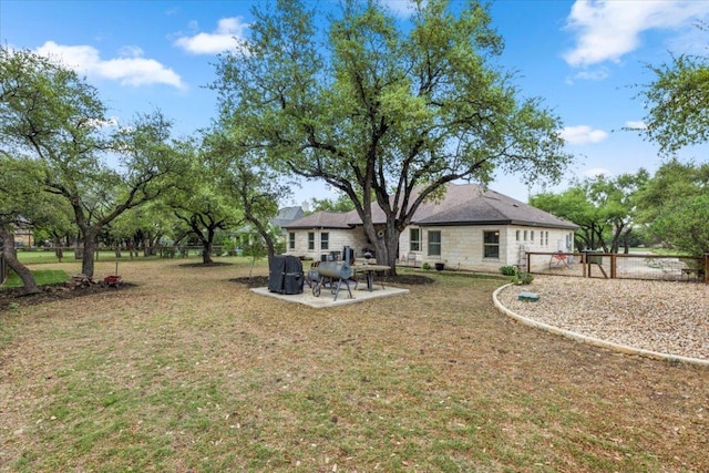 909 Highland Spring Ln, Georgetown, TX 78633 - view of grassy yard featuring a patio area