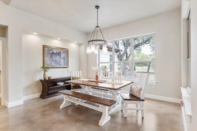 909 Highland Spring Ln, Georgetown, TX 78633 - dining room featuring a chandelier and baseboards