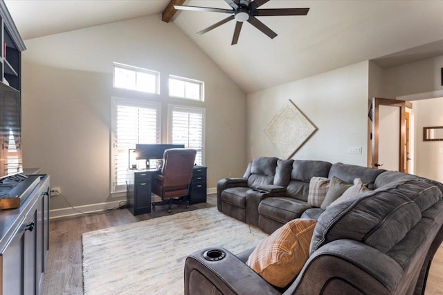 909 Highland Spring Ln, Georgetown, TX 78633 - living area with a ceiling fan, wood finished floors, an office area, beam ceiling, and high vaulted ceiling
