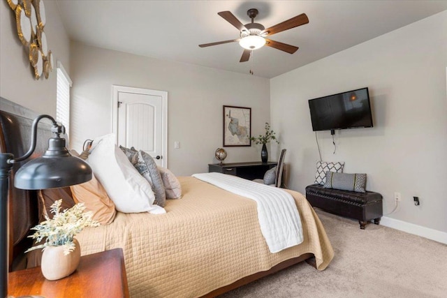 909 Highland Spring Ln, Georgetown, TX 78633 - bedroom with carpet floors, a ceiling fan, and baseboards