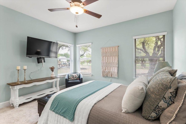 909 Highland Spring Ln, Georgetown, TX 78633 - carpeted bedroom with a ceiling fan and baseboards