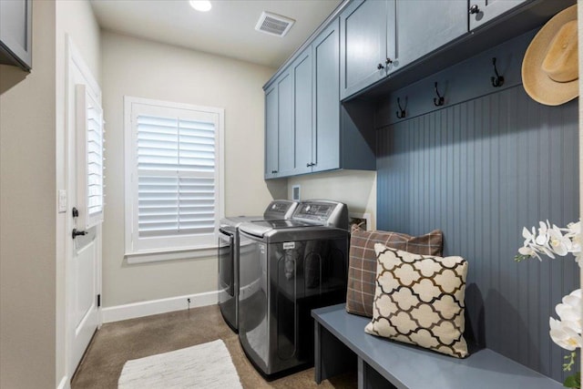 909 Highland Spring Ln, Georgetown, TX 78633 - laundry area featuring washing machine and clothes dryer, cabinet space, baseboards, and carpet floors
