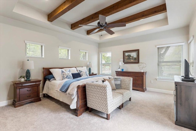 909 Highland Spring Ln, Georgetown, TX 78633 - bedroom with light carpet, baseboards, beam ceiling, ceiling fan, and a raised ceiling