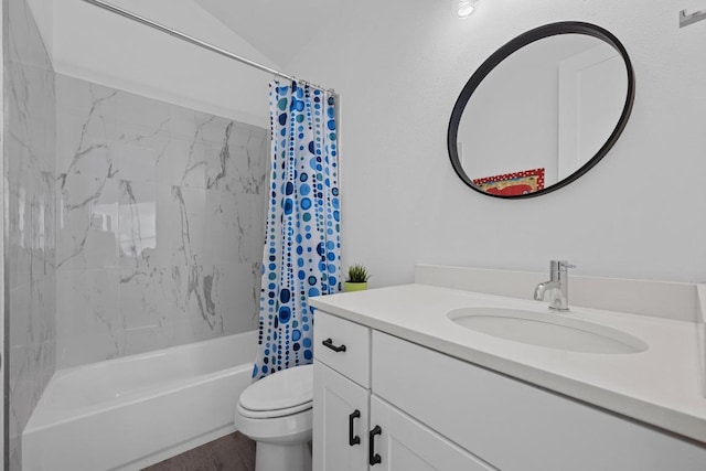 bathroom featuring toilet, vanity, shower / tub combo, and wood finished floors