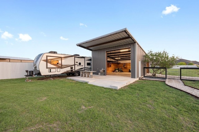 back of property featuring a patio area, fence, and a yard