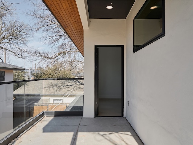 411 Krebs, Austin, TX 78704 - doorway to property with stucco siding and a balcony
