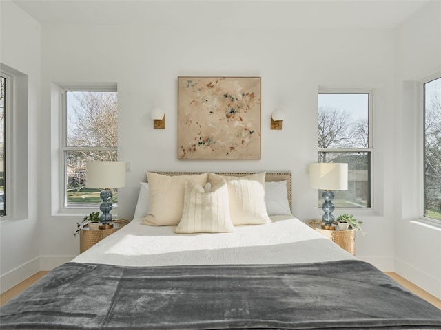 411 Krebs, Austin, TX 78704 - bedroom featuring wood finished floors and baseboards