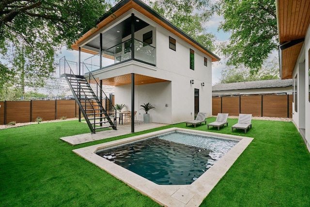 411 Krebs, Austin, TX 78704 - rear view of property with stairs, stucco siding, and a patio
