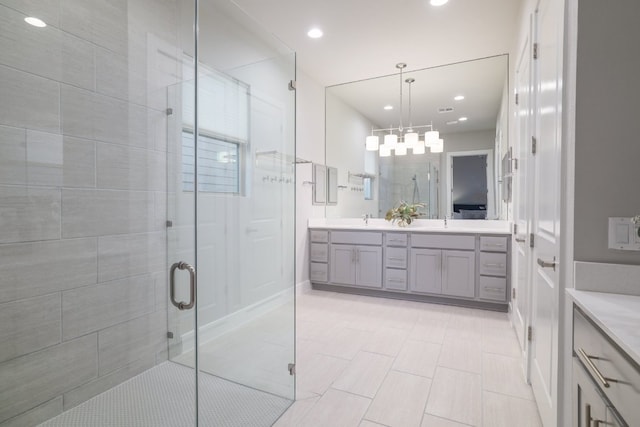 2513 Moreno St, Austin, TX 78723 - full bathroom with double vanity, a shower stall, recessed lighting, a chandelier, and tile patterned floors