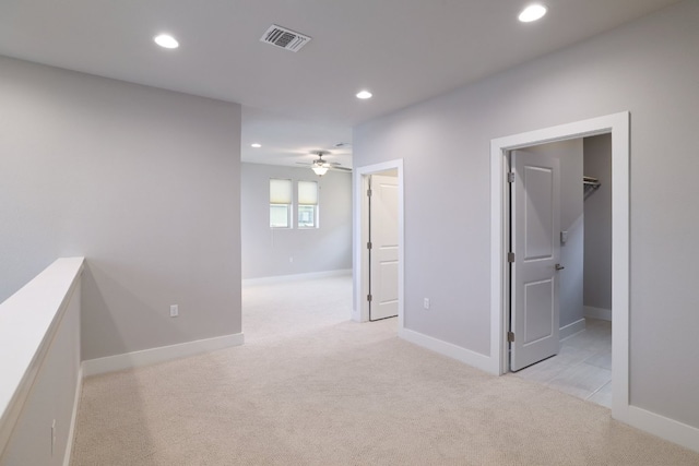 2513 Moreno St, Austin, TX 78723 - corridor with recessed lighting, light colored carpet, and baseboards