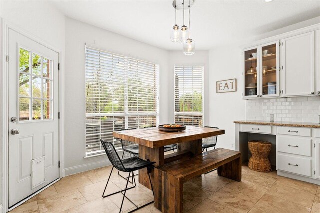 1019 Lone Buck Pass, Cedar Park, TX 78613 - dining area with healthy amount of natural light and light tile patterned flooring