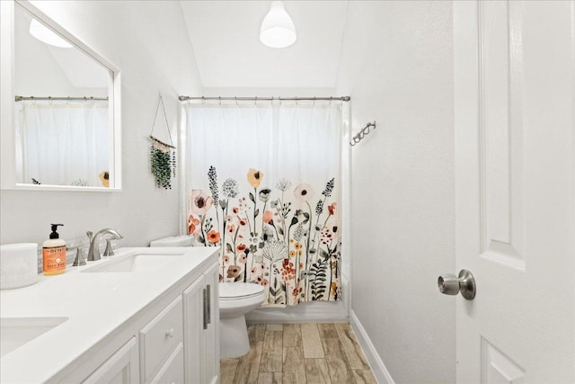 1019 Lone Buck Pass, Cedar Park, TX 78613 - bathroom featuring double vanity, wood finished floors, and shower / tub combo