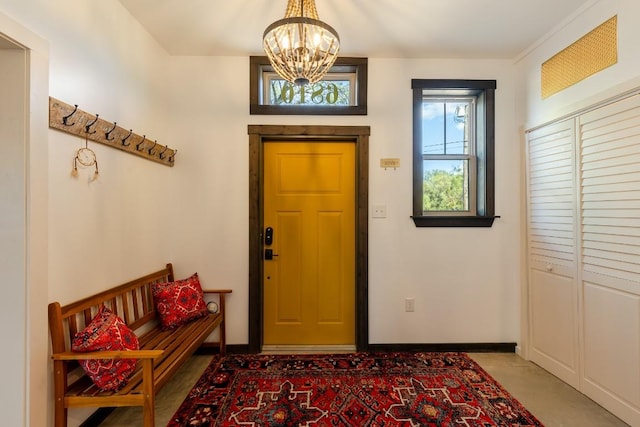 6810 River Oaks Dr, Kingsland, TX 78639 - entrance foyer featuring a chandelier and baseboards