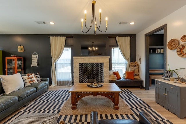 6810 River Oaks Dr, Kingsland, TX 78639 - living area featuring a chandelier, plenty of natural light, light wood-type flooring, and recessed lighting