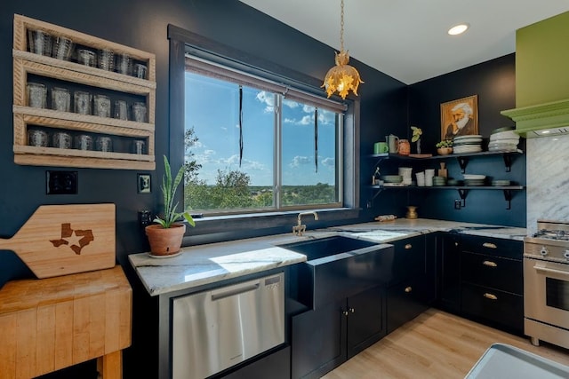6810 River Oaks Dr, Kingsland, TX 78639 - kitchen featuring stainless steel appliances, open shelves, dark cabinetry, light stone counters, and a chandelier