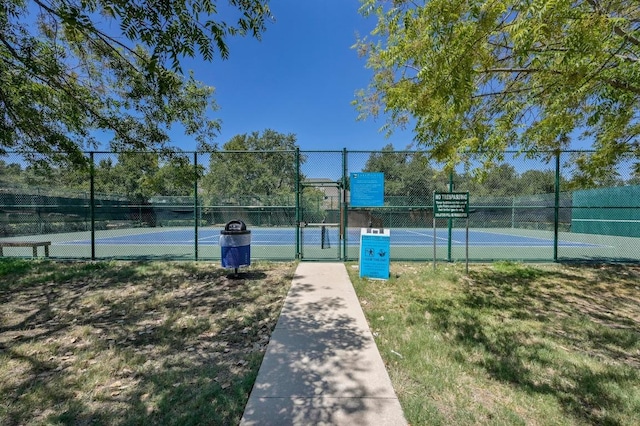 12452 Fairfax Ridge Pl, Austin, TX 78738 - view of tennis court with a gate