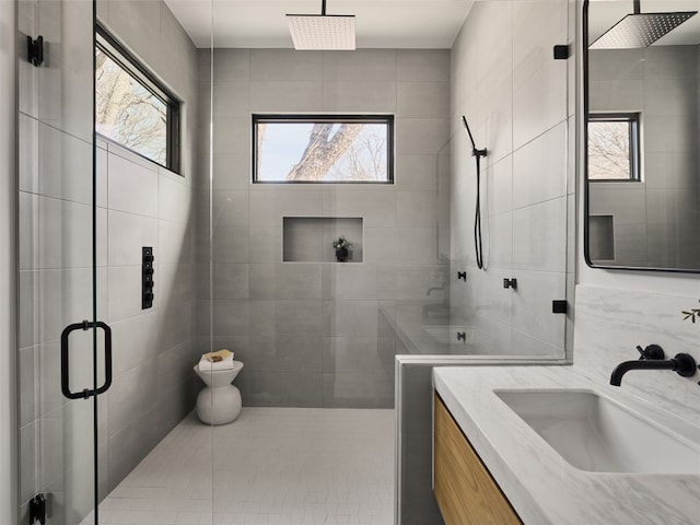 3210 Thompson, Austin, TX 78702 - bathroom with healthy amount of natural light, a shower stall, and vanity