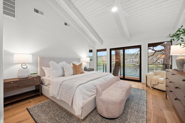 bedroom featuring access to outside, beam ceiling, and visible vents