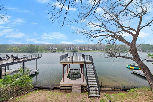 view of dock with a water view
