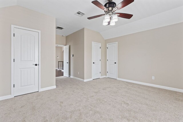 3312 Cortes Pl, Round Rock, TX 78665 - unfurnished bedroom with lofted ceiling, light colored carpet, and ceiling fan