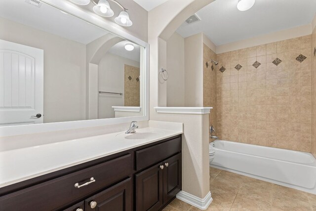3312 Cortes Pl, Round Rock, TX 78665 - bathroom featuring vanity, shower / tub combination, and tile patterned floors