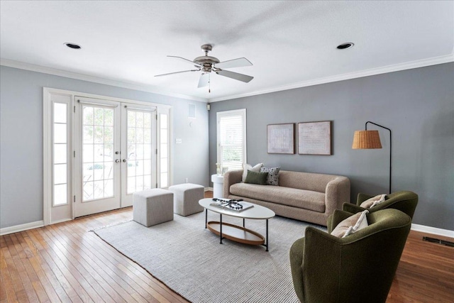 2210 Meadowbrook Dr, Austin, TX 78703 - living area featuring french doors, wood-type flooring, a ceiling fan, and crown molding