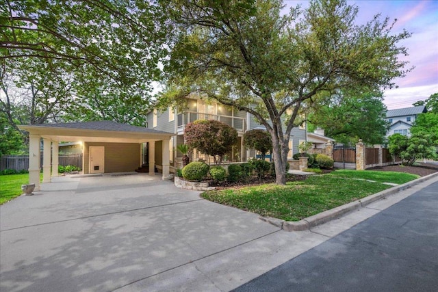 2210 Meadowbrook Dr, Austin, TX 78703 - obstructed view of property featuring driveway and a carport