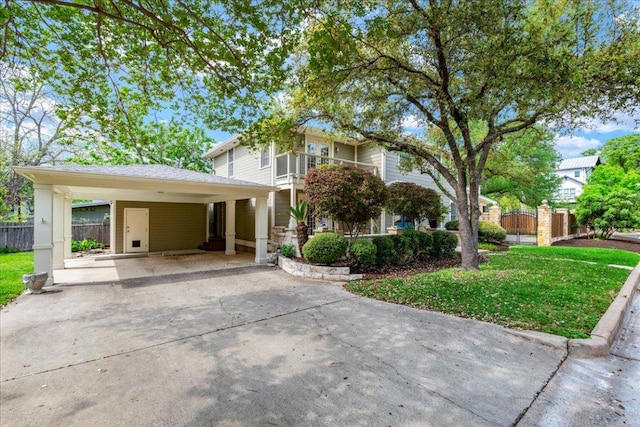 2210 Meadowbrook Dr, Austin, TX 78703 - view of front of house featuring driveway and an attached carport