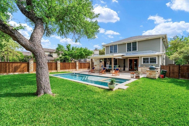2210 Meadowbrook Dr, Austin, TX 78703 - rear view of house featuring a fenced backyard, a patio, a pool with connected hot tub, and french doors