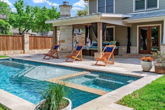 2210 Meadowbrook Dr, Austin, TX 78703 - view of swimming pool featuring french doors, a patio, and a pool with connected hot tub