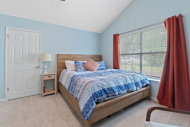 198 Prairie Springs Loop, Georgetown, TX 78626 - bedroom featuring vaulted ceiling, baseboards, and carpet