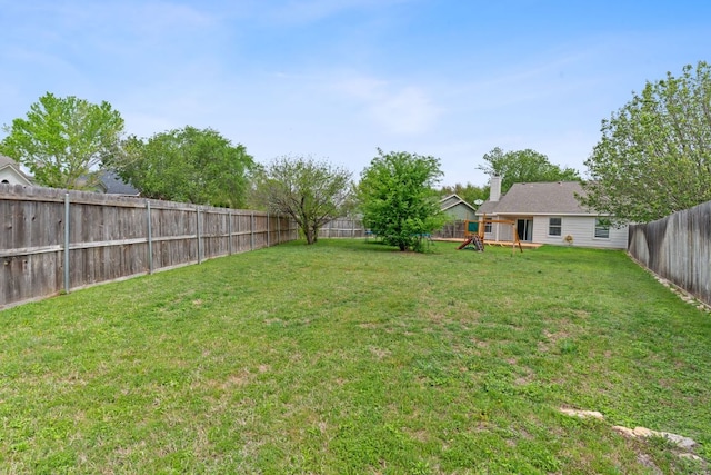 198 Prairie Springs Loop, Georgetown, TX 78626 - view of yard with a fenced backyard and a deck