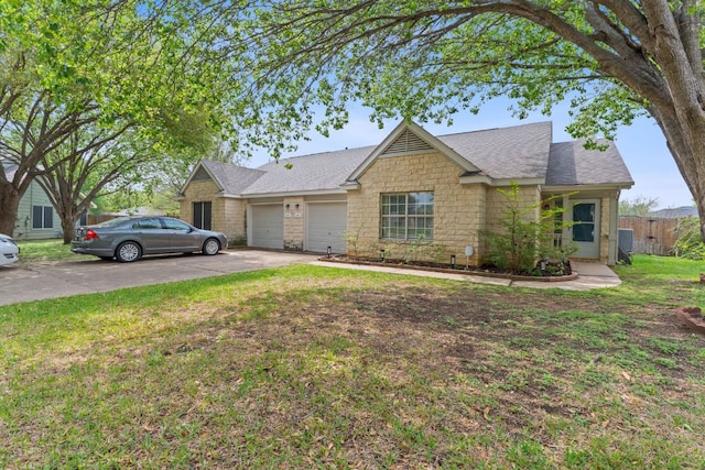 198 Prairie Springs Loop, Georgetown, TX 78626 - single story home with concrete driveway, a front lawn, stone siding, an attached garage, and roof with shingles