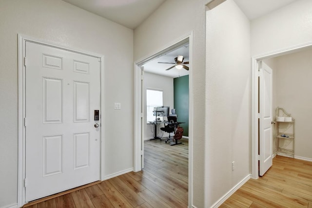 118 Esparza Dr, Bastrop, TX 78602 - entryway featuring light wood-style floors and a ceiling fan