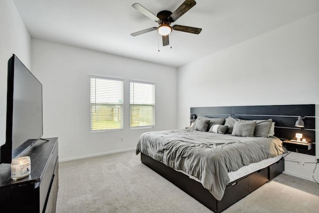 118 Esparza Dr, Bastrop, TX 78602 - carpeted bedroom with baseboards and ceiling fan