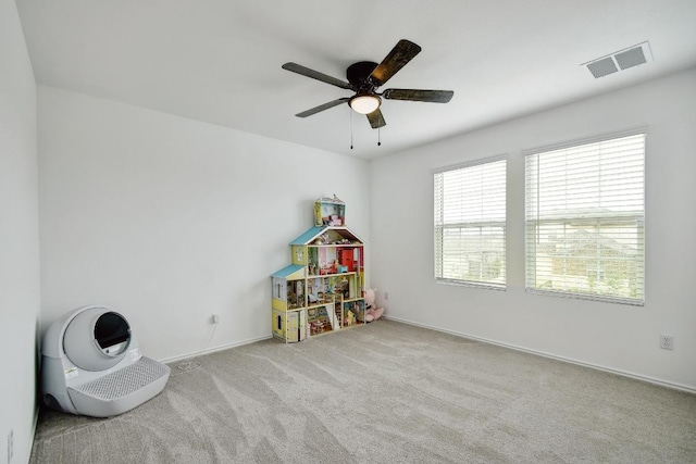 118 Esparza Dr, Bastrop, TX 78602 - rec room with a ceiling fan and carpet