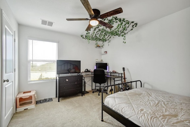 118 Esparza Dr, Bastrop, TX 78602 - carpeted bedroom with a ceiling fan
