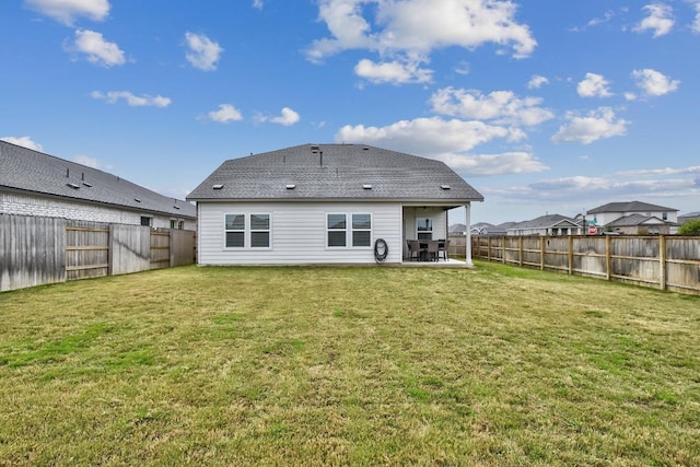 118 Esparza Dr, Bastrop, TX 78602 - rear view of house featuring a patio area and a fenced backyard