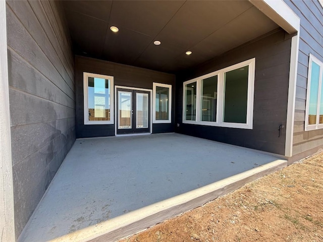 8600 Dongan Dr, Austin, TX 78744 - view of patio featuring french doors