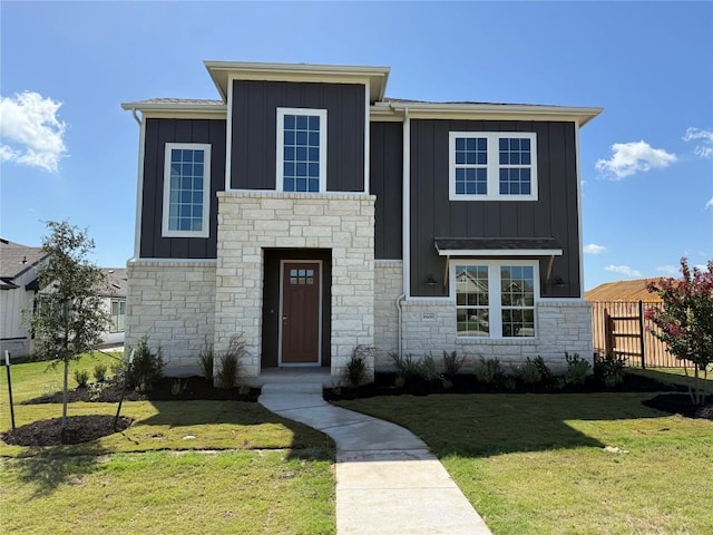 8600 Dongan Dr, Austin, TX 78744 - contemporary house featuring board and batten siding and stone siding