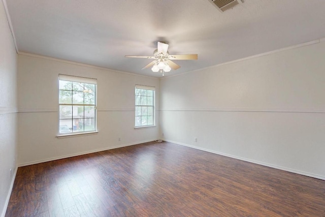1711 Lloydminister Way, Cedar Park, TX 78613 - spare room featuring wood finished floors, a ceiling fan, crown molding, and baseboards