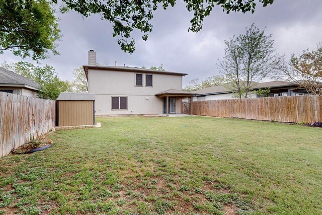 1711 Lloydminister Way, Cedar Park, TX 78613 - rear view of house with a chimney and a patio area