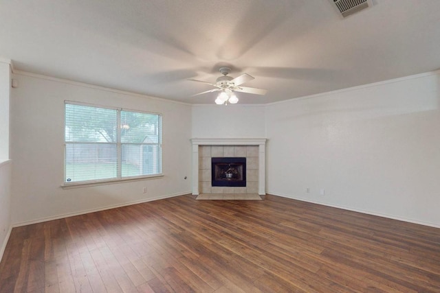 1711 Lloydminister Way, Cedar Park, TX 78613 - unfurnished living room featuring a ceiling fan, hardwood / wood-style floors, crown molding, a fireplace, and baseboards