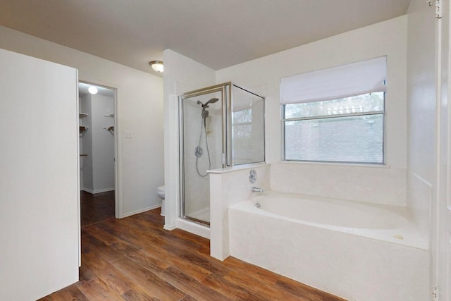1711 Lloydminister Way, Cedar Park, TX 78613 - full bath with a garden tub, a shower stall, a spacious closet, wood finished floors, and toilet
