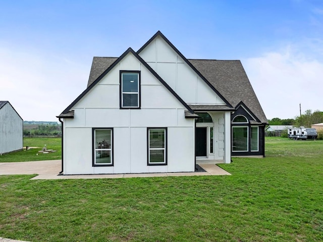 150 Huntclub Dr, Jarrell, TX 76537 - rear view of property featuring a yard and roof with shingles