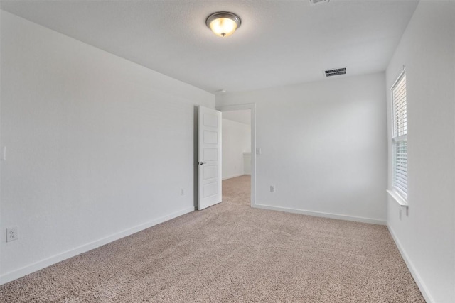 13609 Baileyfield Dr, Pflugerville, TX 78660 - unfurnished room with light carpet and baseboards