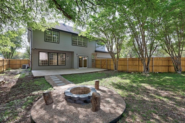 3505 Galena Hills Loop, Round Rock, TX 78681 - rear view of property featuring a patio, an outdoor fire pit, and a fenced backyard